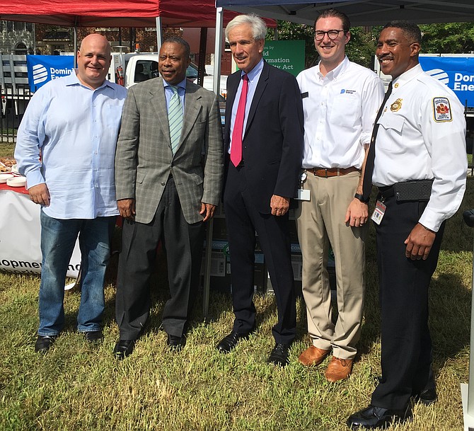 Public officials celebrate Dominion Energy’s donation of air conditioning units to ARHA, the local public housing authority. From left are Daniel Bauman, chair of ARHA’s Board of Commissioners; Keith Pettigrew, ARHA’s CEO; state Sen. Dick Saslaw (D-35); Dominion’s Scott Reamy; and City Councilman Willie Bailey.