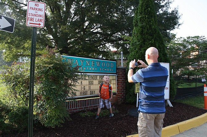 Five-year-old Joseph Harding poses for dad, Matthew, on his first day of kindergarten.