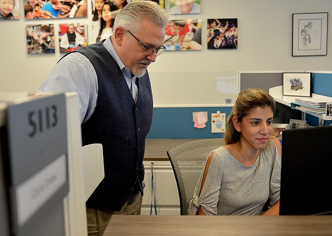 “We’re open for business,” said Armando Peri, ombudsman for the newly created Fairfax County Public Schools’ Office of the Family and Student. School opens this week, but Peri and Carla Dallas, the department’s administrative assistant, have already been handling calls.  