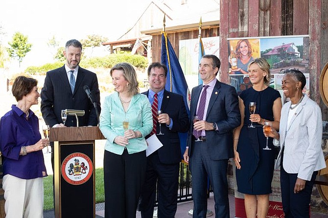 Celebrating Thursday's economic announcement at The Winery at Bull Run are (l to r), Fairfax County Board of Supervisors Chairman Sharon Bulova, winery owner Jon Hickox, U.S. Rep. Barbara Comstock, Del. Tim Hugo, Gov. Ralph Northam, co-owner Kim Hickox, Cathy Hudgins, Hunter Mill District supervisor.