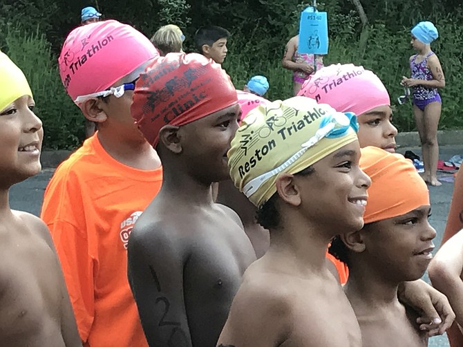 Children line up and are ready to hit the deck for the 2018 Reston Splash and Dash, produced by CORE Foundation. Event proceeds benefited “Kids Helping Kids,” a CORE Foundation program that enables triathlon experiences for low-income youth.
