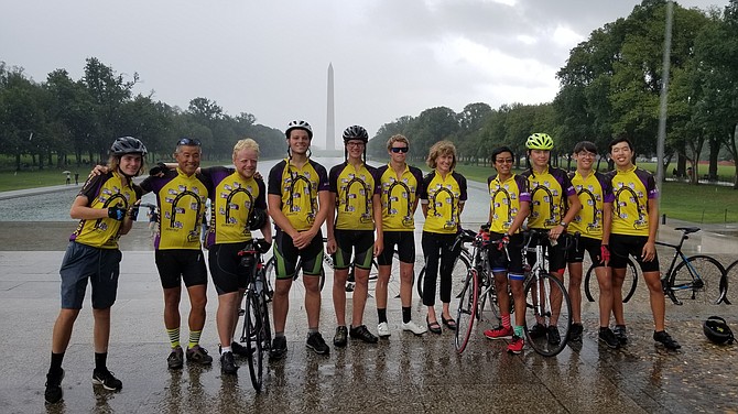 Almost done! The scout members of the cross country ride are photographed as they finally arrive in D.C. – in the pouring rain! After this photo op, the group hopped back on their bikes for a “short” ride to Great Falls and a “Welcome Home” party at the home of Troop 55 Leader (and ride participant) Gary Pan.