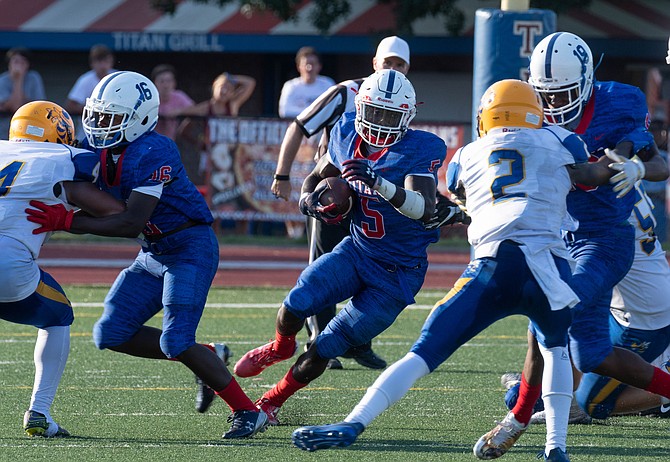 T.C. Williams running back Anthony Eaton scored six touchdowns against Osbourn Park on Aug. 24.