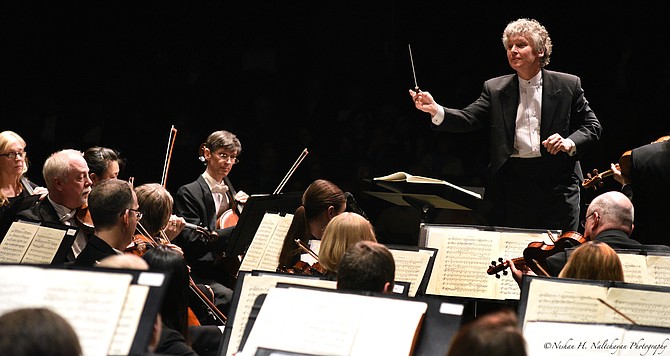 Music director and conductor Christopher Zimmerman leading the Fairfax Symphony Orchestra.