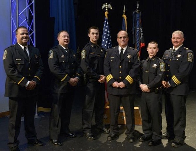 From left, Lieutenant Tu Farhan, Lieutenant Thomas Taylor, Officer Ryan Colligan, Chief James Morris, Officer John Nesbitt, and Major Daniel Janickey. 