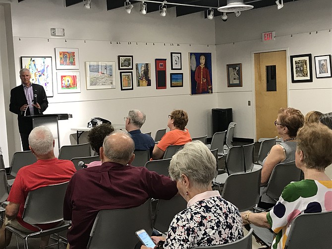 The audience listens attentively during the presentation by Doug Britt, Reston Association Environmental Advisory Committee (EAC) member and Project Director for the 1st Reston Annual State of the Environment Report, RASER.
