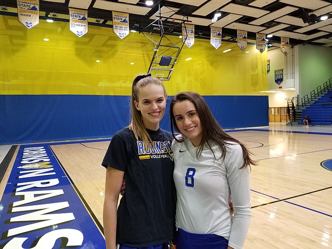 Olivia Womble, left, and Faith Lowery helped the Robinson volleyball team sweep Lake Braddock on Tuesday.