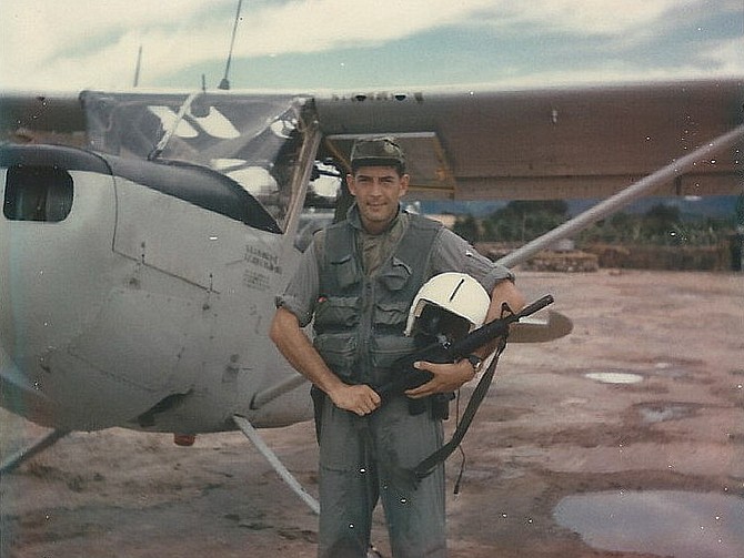 Walt Potock by his USAF O-1 Bird Dog aircraft in 1967-68 Vietnam.