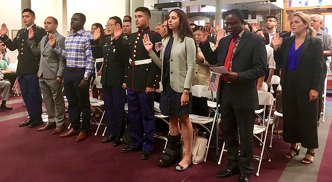 Thirty-five people from 25 countries became U.S. citizens at a naturalization ceremony held Tuesday, Sept. 11 at city hall.