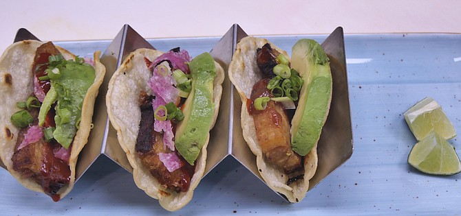 Pork belly tacos prepared by Chef Steve Rosenthal at Tequila and Taco.