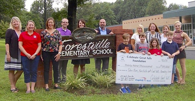 From left:  Erin Lobato - FES parent and golf committee co-chair, Julie Ryan - FES PTA treasurer/former PTA President, Meralee Fredenburgh - FES parent and golf committee member, Ken Junge - CRES Principal, Sara Harper - GFES Principal, Todd Franklin - FES principal, Lisa Cuomo - CRES parent and golf committee member, Meredith Broome - GFES parent and golf committee member, Barbara Morehouse – golf committee co-chair, Kristin Dailey - GFES parent and golf committee member, Children - current students.  Not pictured, golf committee members: Diane Emery (CRES), Larisa Caicedo DeThero (GFES), Julie Rothmeijer (FES), Maryellen Moline (FES), Matt Matay (GFES).