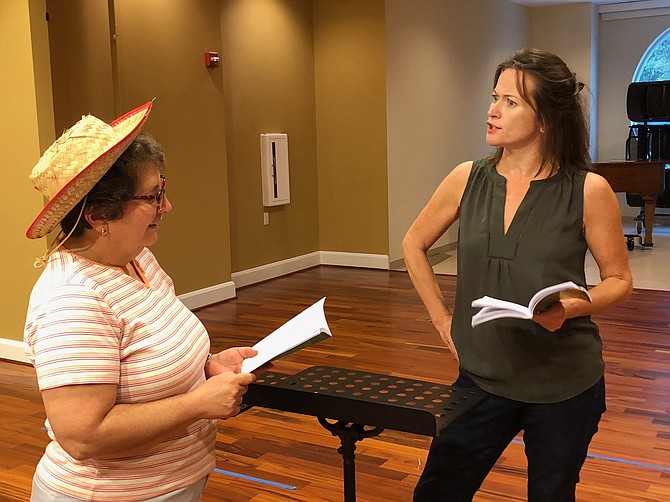 Shayne Gardner and Elizabeth LeBoo in rehearsal for "A Tuna Christmas" presented by the McLean Community Players.
