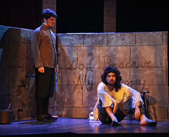 Tim Caron (Edmund Dantes/Count of Monte Cristo) and Nic Barta (guard) star in ACCT’s production of “The Count of Monte Cristo.”