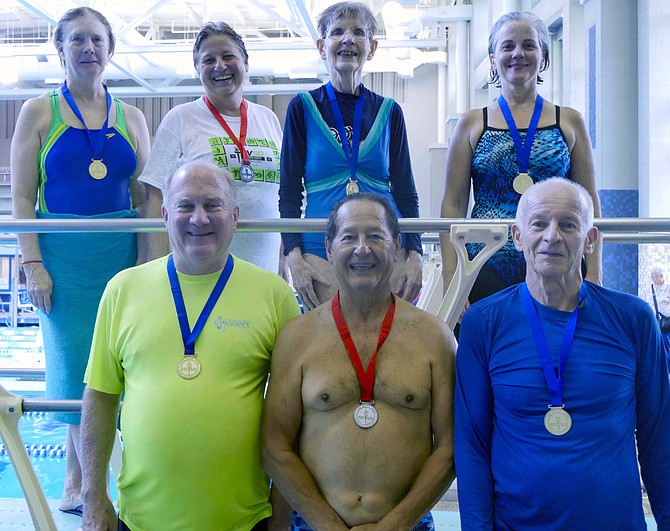 Medalists at the Northern Virginia Senior Olympics diving events Saturday, Sept. 15.  Duane Clayton-Cox from Burke (first row, left) won a blue ribbon in the 65-69 men’s category.