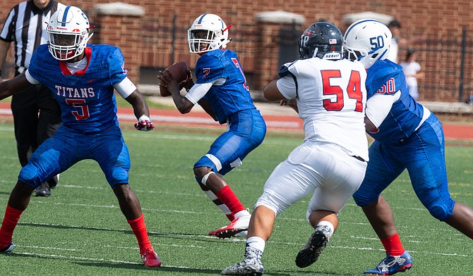 T.C. Williams junior Robert Longerbeam started at quarterback against Patriot on Saturday, Sept. 22.