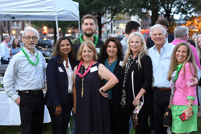 Chadwick’s owner Trae Lamond, in back, with David Martin, Kellye Clarke, OTBPA President Catherine Foltz, Amy Jackson, Kendra Carey, Roger Parks and Lucelle O’Flaherty Sept. 21 at Supper Under the Stars at Waterfront Park.