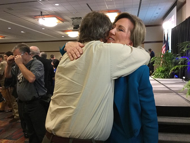 U.S. Rep. Barbara Comstock (R) embraces a longtime friend after the first debate with Democratic challenger Jennifer Wexton on Sept. 21 in Leesburg.