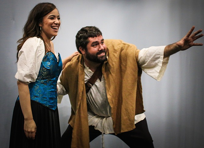 Alex Bryce rehearses the role of Quasimodo with Adelina Mitchell’s Esmeralda in TAP’s production of “The Hunchback of Notre Dame.”