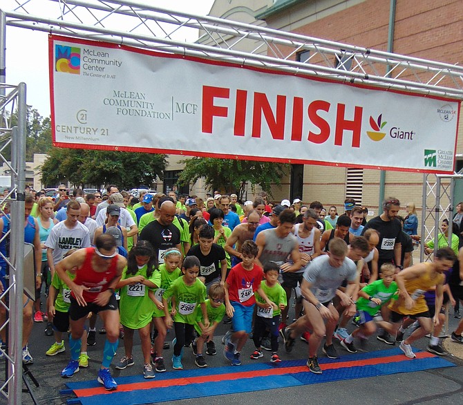 The starting line for the 10th Annual McLean 5K Run, which had 500 runners and took place on Saturday, Oct. 6, 2018, at the McLean Square Shopping Center in McLean.  