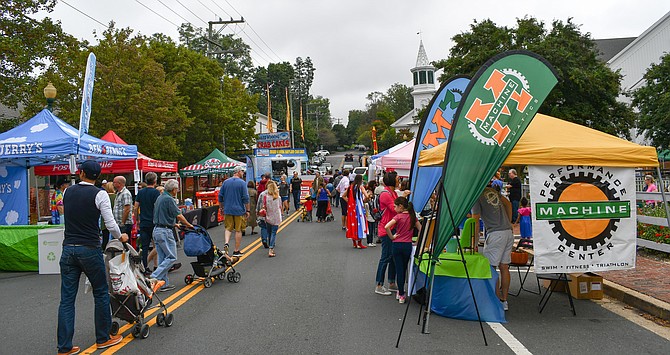 Vienna Presbyterian Church’s steeple looms over Church Street on Oktoberfest. 