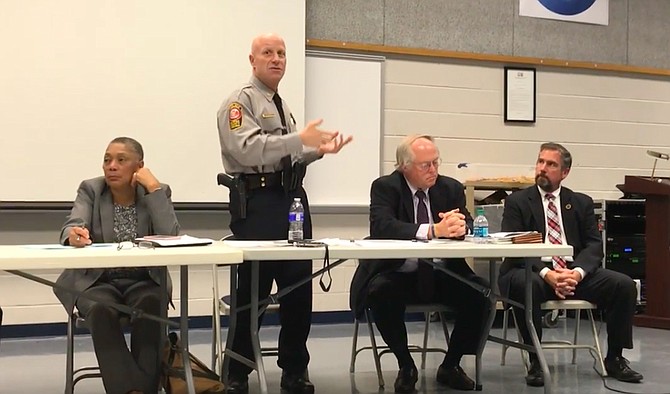 Police Chief Ed Roessler speaks last November in Mount Vernon about the new Civilian Review Panel and Independent Police Auditor. Also pictured, Shirley Ginwright, who served on the Ad Hoc Police Practices Review Commission and Implementation Group; Adrian Steel, inaugural chairman of the Civilian Review Panel; and Richard Schott, the Fairfax County Independent Police Auditor.