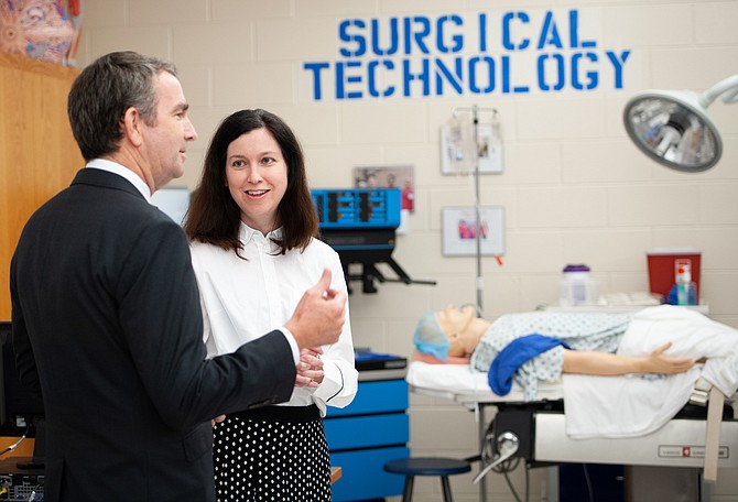 Gov. Ralph Northam (left) and ACPS Health Sciences Academy teacher Laura Evans.