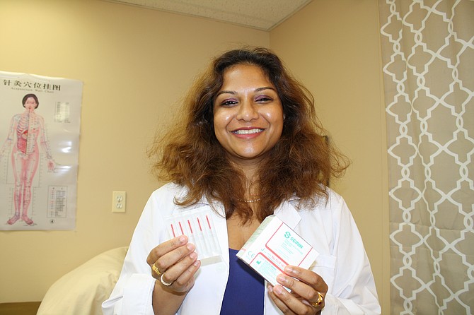 It's needles and meditation for Anita Tadavarthy at Empiracal Grace in Springfield.