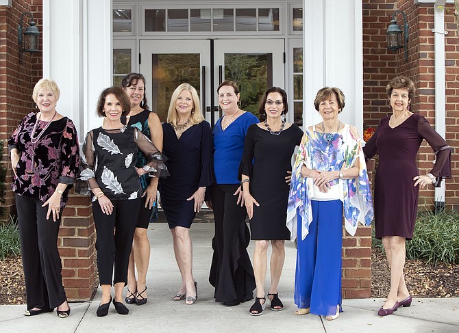 Fashion show models: (From left) Marcia Siegert, Karen Bennett, Lisa Franklin, Patsie Uchello, Linda Ely, Denise Wight, Bonnie Lilley, and Jeanne Gayler.