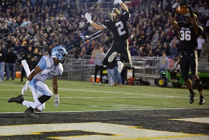 Tahj Summey #36 intercepts the pass of Centreville QB Pressley Egbers.