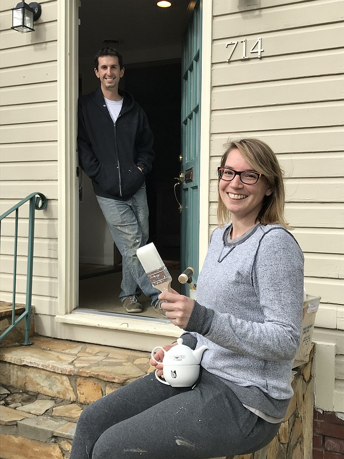 Owner of Elden Street Tea Shop, Rachel Eisenfeld, is ready for a pot of tea before she and Michael Rozner begin painting the interior of her new shop located on a historic street in downtown Herndon.