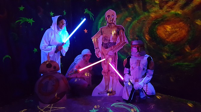 Volunteers for Reston Association's 'Halloween House and Trick-or-Treat Trail' at Walker Nature Center dressed in costume for the event. They obviously had as much fun as the children who attended the event. 
