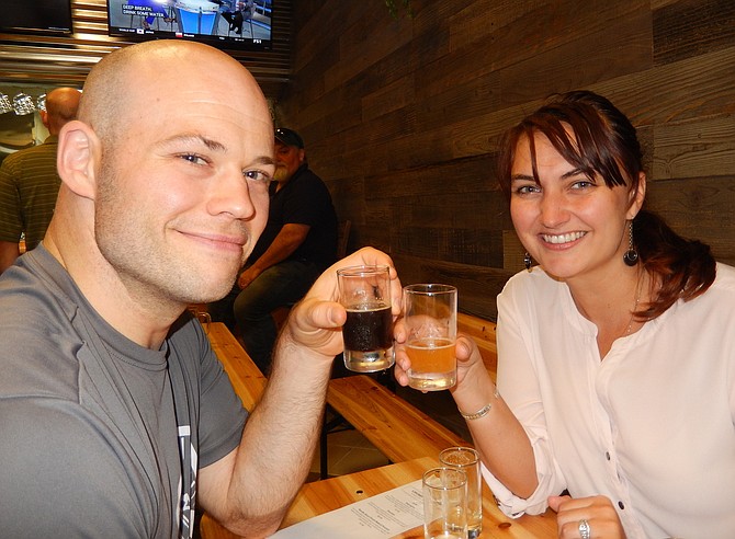 Fairfax residents Jeff and Heather Waye enjoy their beer flights.