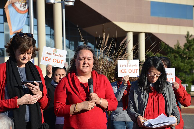 From left, Mary Lareau (DMV Sanctuary Congregation), Michelle LaRue, M.D. (CASA in Action) and Sookyung Oh (NAKASEC) speak on behalf of their Fairfax for All coalition. The group says that the county’s One Fairfax Resolution fails to address the immediate issues being faced by immigrant residents.