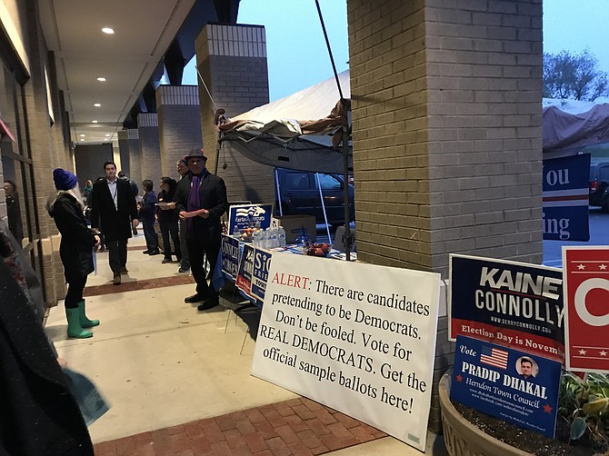 A sign outside of one of the polling stations in the Town of Herndon on Election Day, Tuesday, Nov. 6, 2018, references a concern of some incumbent and challenging candidates running for seats on the Herndon Town Council.