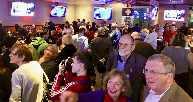 Local Democrats watch Tuesday's election results come in at Glory Days Grill.