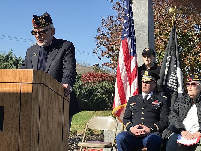 1st Vice Commander Bob Thompson of the American Legion Wayne M. Kidwell Post #184 gives the Welcome at the 2018 Veterans Day Observance held at the Herndon Veterans Memorial on the Town Green.