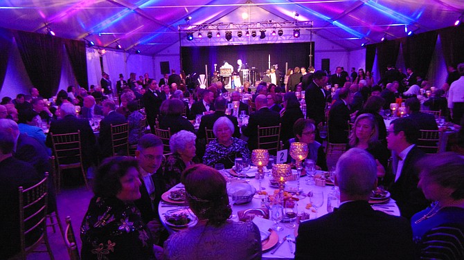 Diners under the Rizer Pavilion tent at the Workhouse Arts Center.