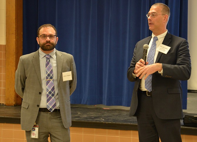 From left: Project manager Gibran Abifadel and Director of Fairfax County Dept. of Transportation Tom Biesiadny present the recommendation A-1 to improve the Balls Hill/Old Dominion intersection to a meeting of residents. The meeting was originally scheduled to take place earlier in the month, but was postponed due to the snow event.