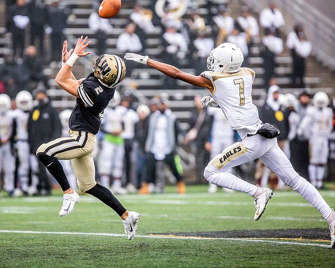 Taylor Morin #2 glances over his shoulder before securing a reception that he would take 78 yards for a touchdown.