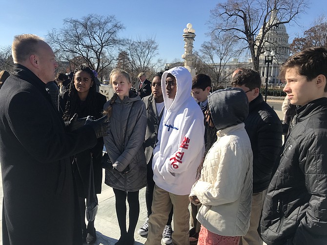 Browne Academy 8th graders meet Indiana Solicitor General Thomas Fisher, who argued the Timbs v. Indiana case before the Supreme Court.
