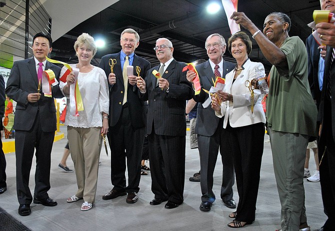 Sharon Bulova – second from right – with (from left): Del. Mark Keam (D-35), State Sen. Janet Howell (D-32), Supervisor John Foust (D-Dranesville), U.S. Rep. Gerry Connolly (D-11), Del. Ken Plum (D-36) and Supervisor Catherine Hudgins (D-Hunter Mill).