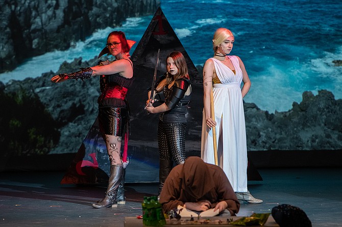 "She Kills Monsters: Young Adventurers Edition" features several strong female roles. Here, adventurers Lilith (Grace Horner, left), Tilly (Claire Callaway, center), and Kaliope (Erin Maxwell, right) ready for action behind Chuck, the Dungeon Master (Davis Ingalls).