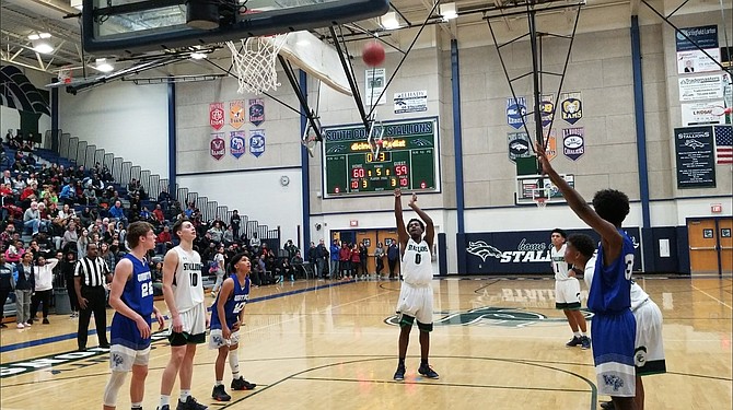 South County junior Will Wilson scored the Stallions’ final six points at the free-throw line during an overtime win against West Potomac on Dec. 14.