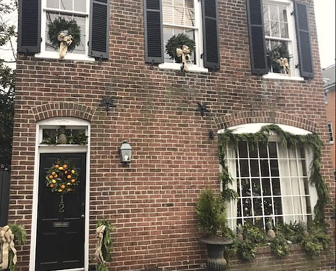 Third Place: The home of Rebecca and Taylor Thistlethwaite, 612 Duke St. A federalist-inspired  holiday theme for the entire front of the house and includes fresh fruit of lemons, tangerines and pineapples keeping with the tradition of Alexandria’s early years.