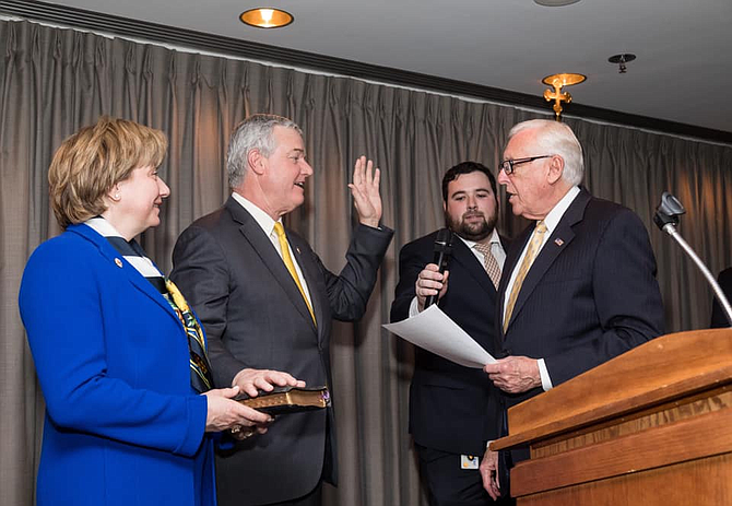 David J. Trone, accompanied by his wife June, is sworn in as U.S. Representative (D-6) by House Majority Leader Steny Hoyer.