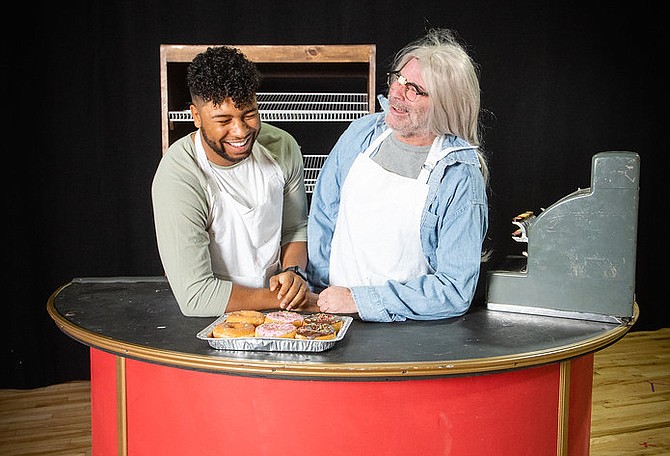 “Superior Donuts” in rehearsal. From left, Bryce Monroe as Franco Wicks and Michael Kharfen as Arthur Przybyszewski in rehearsal for Reston Community Players production of ‘Superior Donuts.’