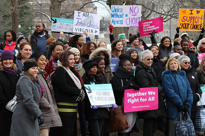 Organizations at rally included Progress Virginia and the Campaign for a Family-Friendly Economy.