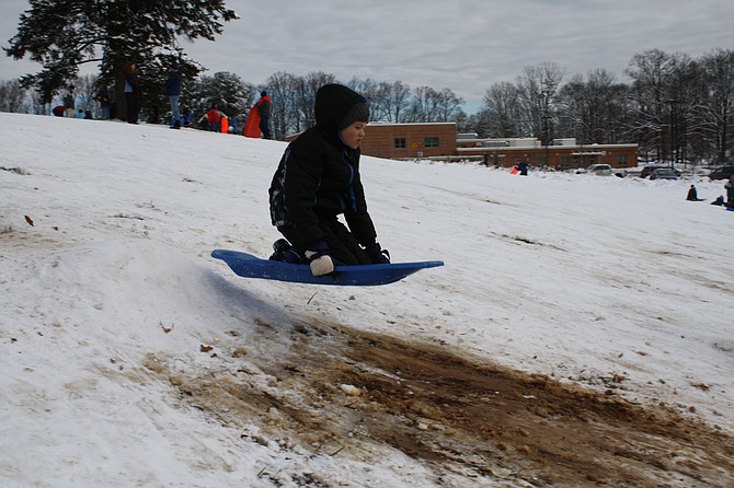 Dylan Lavinder of Springfield gets some serious air on a jump during this week's snow day.