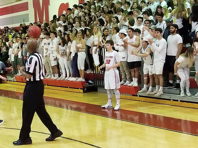 Langley fans heckle McLean junior Elizabeth Dufrane, who scored 20 points during Friday’s victory over the Saxons.