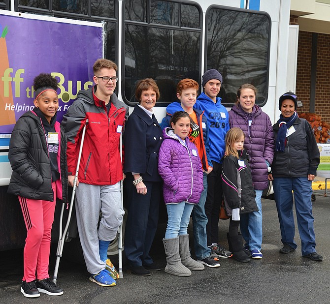 Fairfax County Board of Supervisors Chairman Sharon Bulova added “stuff a bus” duty to her schedule on Saturday, Jan. 19, along with a cadre of county employees, family members, volunteers and staff from the Fox Mill Giant Food Store which hosted the event to benefit nonprofit Helping Hungry Kids.